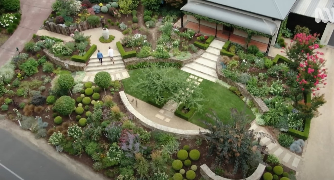 Aerial view of terraced garden with curved pathways and colorful plantings in Concord, CA